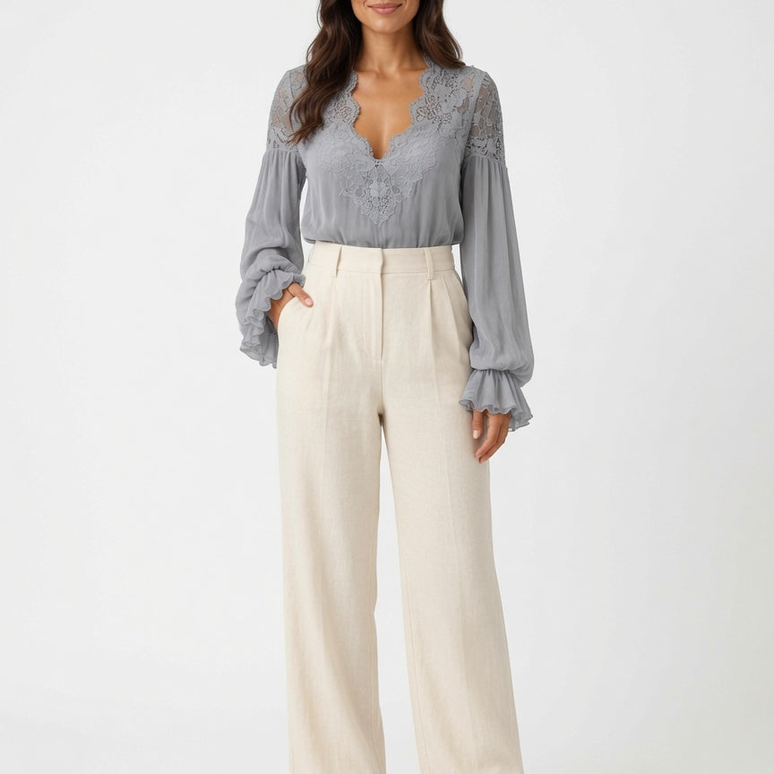 Blouse dames met V-hals en pofmouwen elegant en veelzijdig