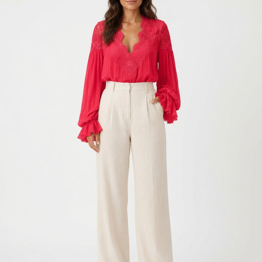 Blouse dames met V-hals en pofmouwen elegant en veelzijdig